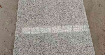 河南芝麻白光面毛板