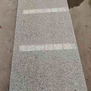 河南芝麻白光面毛板