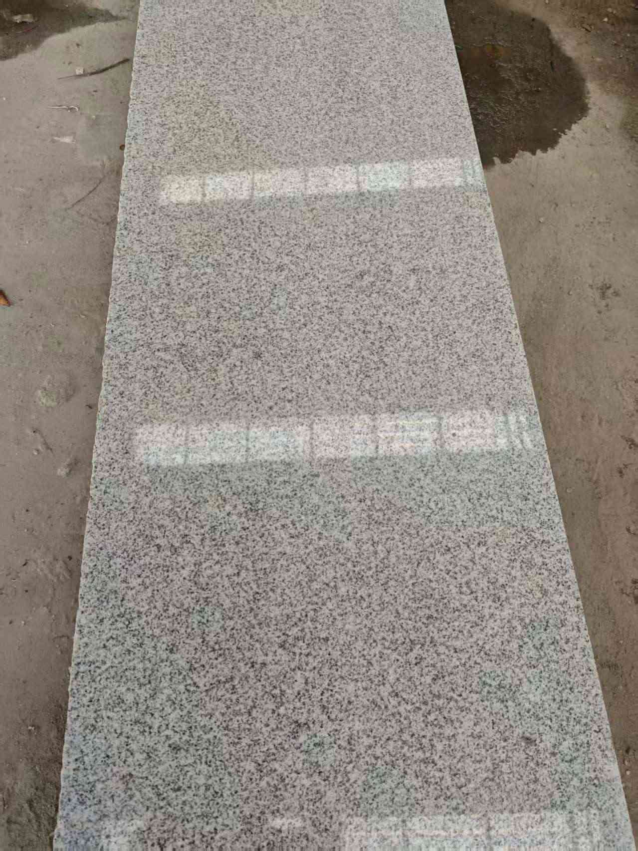 河南芝麻白光面毛板